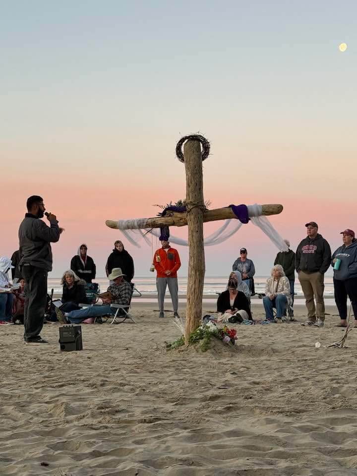 Beach sunrise Easter cross worship service